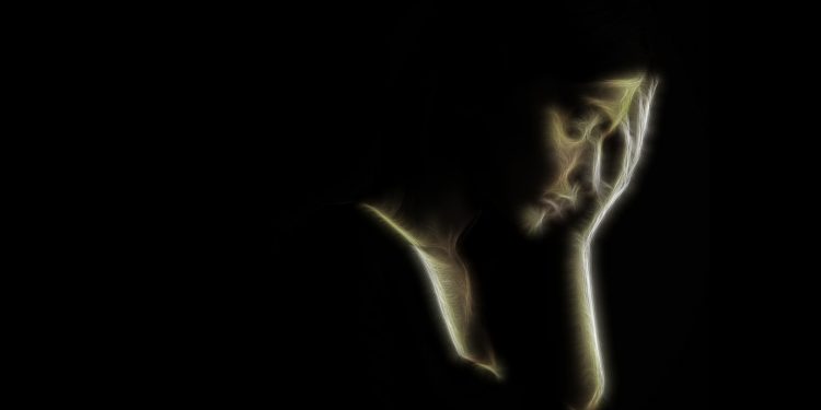 artistic portrait of sad woman